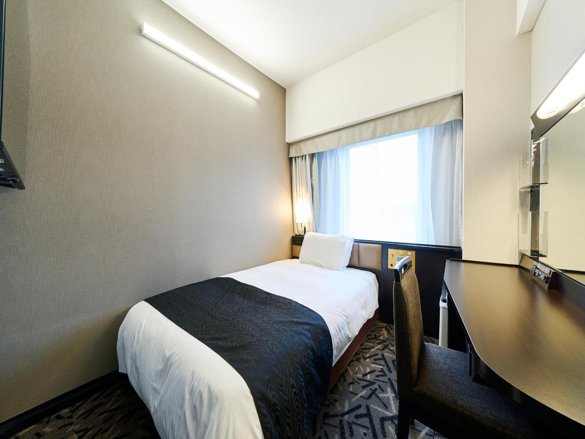 Apa Hotel Takaoka Marunouchi Экстерьер фото